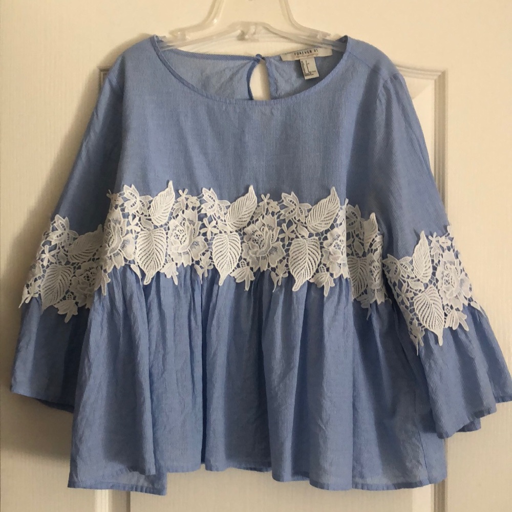 Pinstripe blouse with lace detail